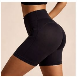 Black high-waisted shorts worn by a person on a beige background